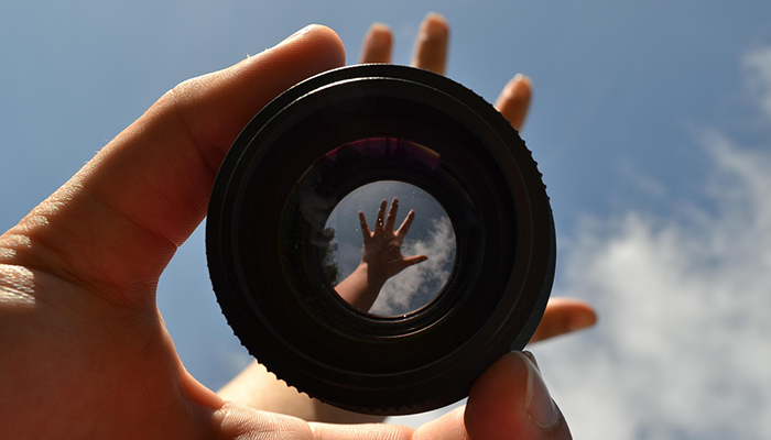 Objetivo fotográfico con manos Objetivo fotográfico con manos